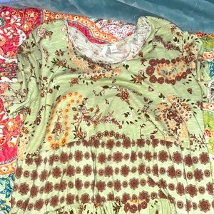 A large green and brown blouse good for events